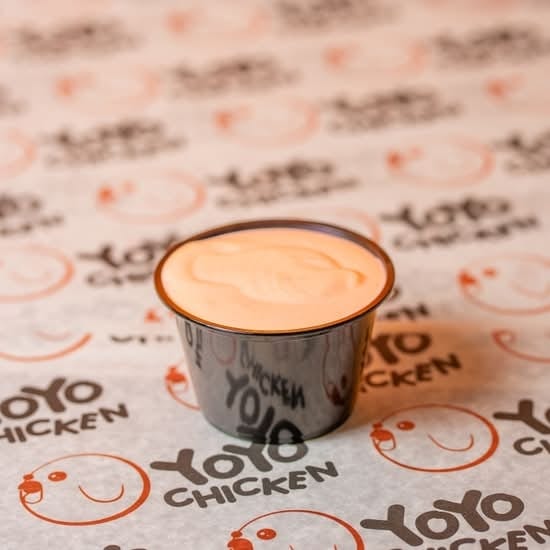 CUP OF YOYO SAUCE.